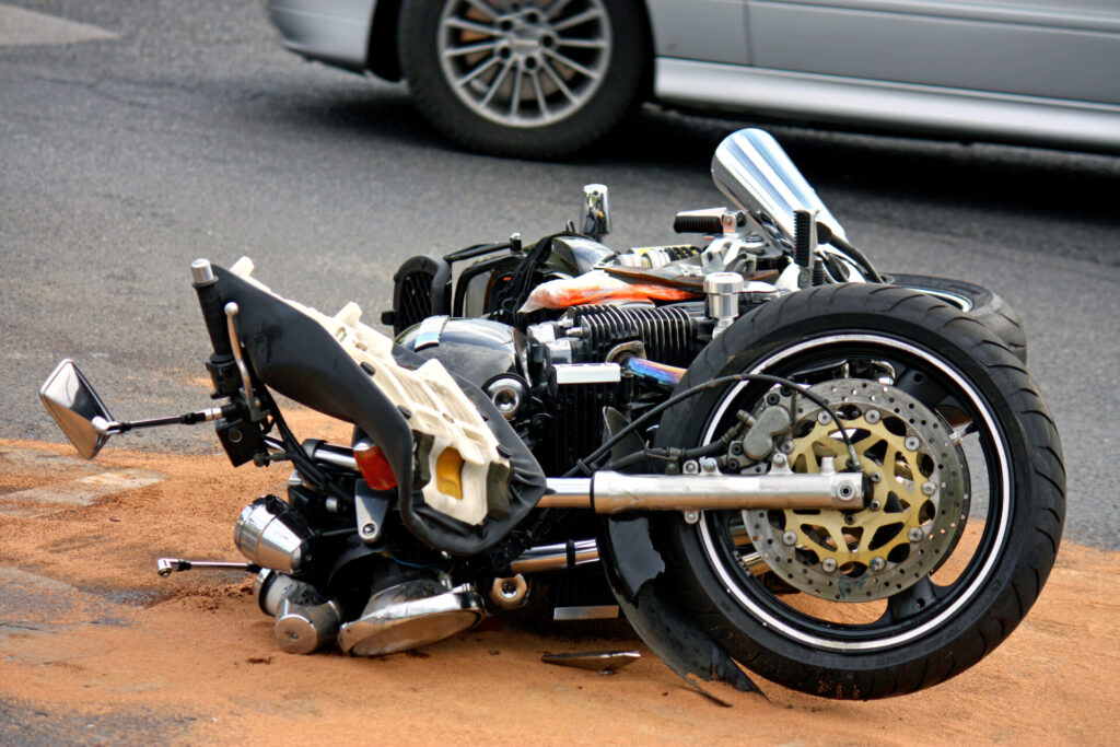 black motorbike accident on the asphalt road