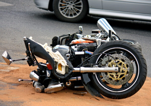 black motorbike accident on the asphalt road